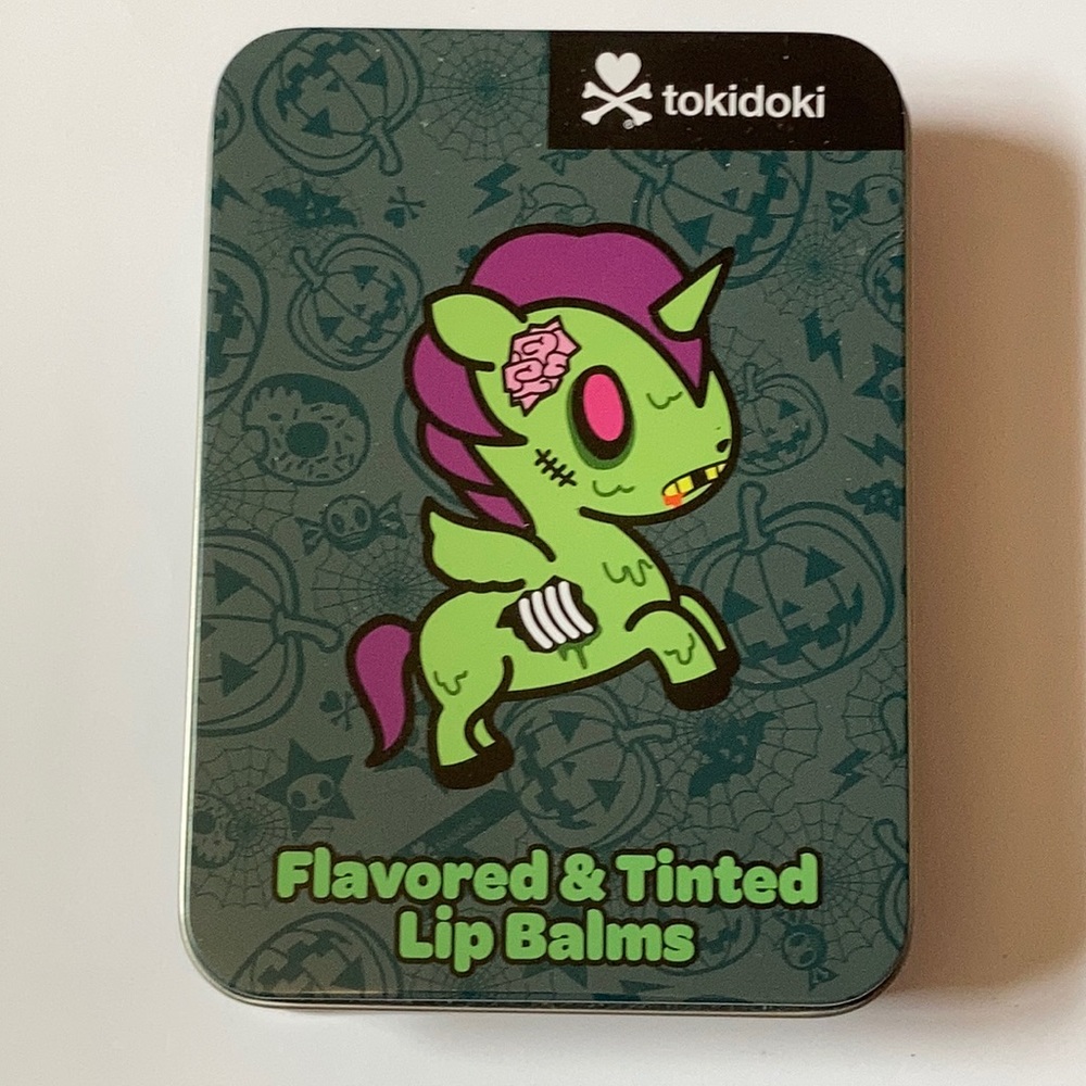 Discontinued collectible Tokidoki tinted scented lip balms.